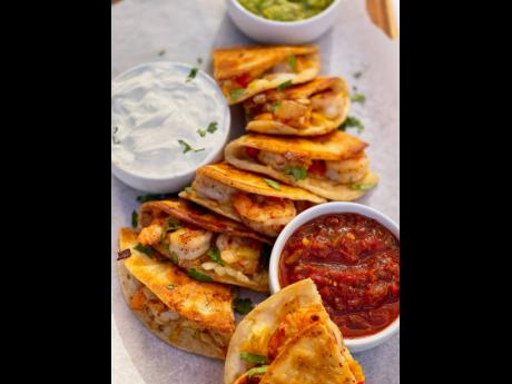 These shrimp quesadillas were served with three dips. 