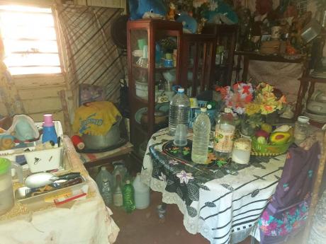 Inside Myrtle Saunders’ home is a picture of despair as she has had to store everything she owns in sections where the roof leakage is tolerable. 