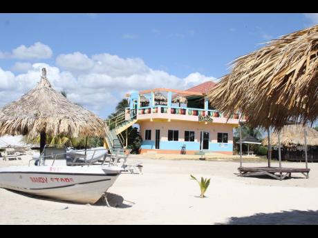 The White Sand Beach restaurant that is operated by Nicholas Graham. Randy Scott and Nicholas’ deceased brother Kavan Graham are listed as co-owners.