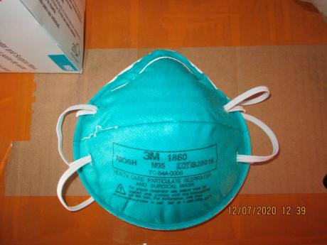 This December 2020 image provided by US Immigration and Customs Enforcement shows a counterfeit N95 surgical mask.