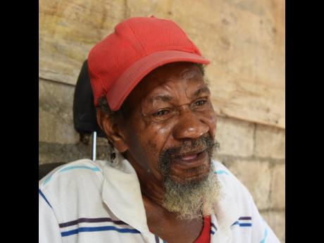 Edmond Campbell is overcome with grief as he recalls how he heard about the death of 51-year-old Winston McKenzie, his nephew. McKenzie was shot and killed on January 29 in Bull Bay, St Andrew.