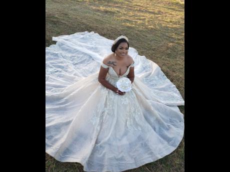 The bride ditched the traditional white and opted for a deep champagne coloured off the shoulder shiny ball gown with beautiful lace and beading. She also went with a matching veils, gold crown and earrings. 