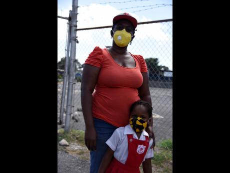 right: Shantal Collins-Grant says that as long as West Indies Basic School is following the protocols, her three-year-old daughter, La’Tivia Grant, should be fine.
