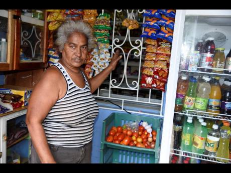 Charmaine Ferguson, a shopkeeper in Patrick City, says she has to compensate for the lack of customers by selling ground provisions.