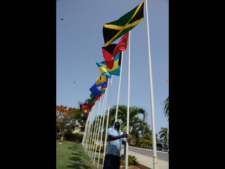 The flags of Caricom members fly at a Heads of Government meeting held in July 2017 in Montego Bay.