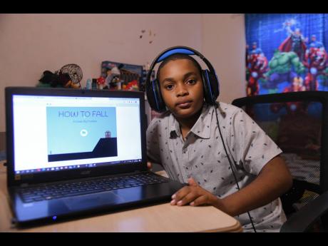 Eleven-year-old Dominic Darby shows off the game he created to conquer hundreds of rivals across 70 countries in a coding competition sponsored by XPRIZE. 