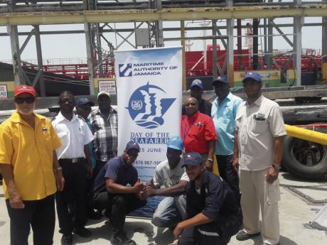 Tugboat crew from Portside Towing at the Maritime Authority of Jamaica’s ‘Day of the Seafarer’ event in 2018.