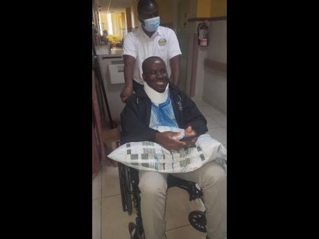 
Tainee pastor Marvin Pryce days after his surgery to repair a herniated disc at the Andrew’s Memorial Hospital. 