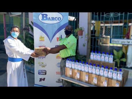 In aiding the nation’s fight against the coronavirus, Barco Caribbean Limited last month donated cases of  Ultra Care Hand Sanitizer to the Missionaries of the Poor, a charity organisation founded by Father Richard Ho Lung. Brother Nabur (left) of Missio