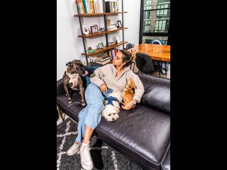 Minali Chandiram, co-founder of Wild One, shares lens time with some dogs wearing her branded products.