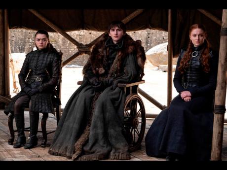 From left: Maisie Williams, Isaac Hempstead Wright and Sophie Turner in a scene from the final episode of ‘Game of Thrones’. 