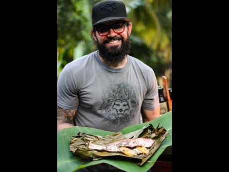 Peppatree’s CEO Nathan Haddad, and chef for the day, is happy with the way his Red Hot Jerk Roast Fish – which had plantains as part of the stuffing – turned out.