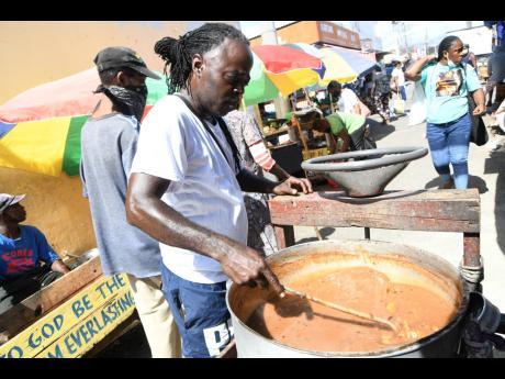 Steve Scott sells soup at the Spanish Town Market while speaking to The Gleaner about how he was affected by the lockdown which was instituted to stem the spread of the novel coronavirus.