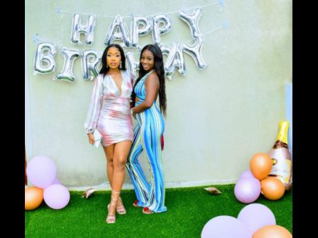 Celebrating her 24th birthday, Shai Trendii strikes a pose with her friend, Brittney Hodges-Marshall. 