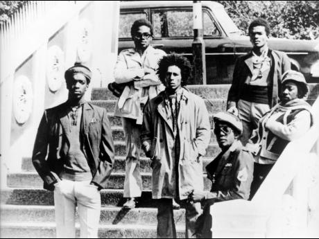 Bob Marley and The Wailers (from left) Peter ‘Peter Tosh’ McIntosh, Aston ‘Family Man’ Barrett, Bob Marley, Earl ‘Wire’ Lindo, Carlton ‘Carly’ Barrett and Neville ‘Bunny Wailer’ Livingston pose for a portrait in 1973 in London, England.