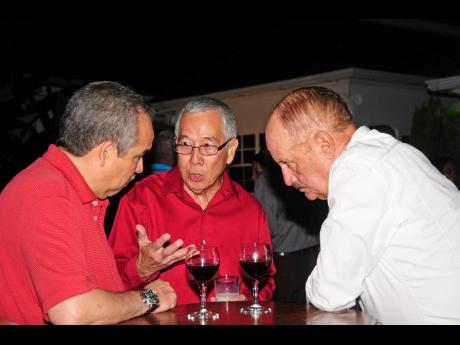 Caribbean Stalwart: Joseph Lowe (centre) was always willing to share his wealth of knowledge and is pictured doing so with Carlos Urriola (left) and Fernando Rivera, both past presidents of the Caribbean Shipping Association (CSA), at an annual meeting of 