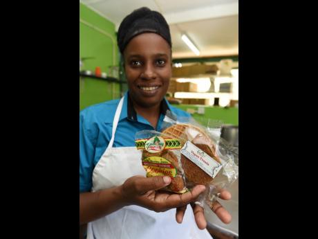 Johnson, the owner of Something Country, shows off her breadfruit cookies and vegan treats.