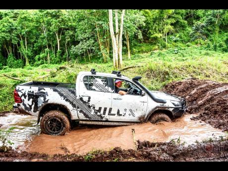 Testing the might of the Toyota Hilux in the mud pit. 