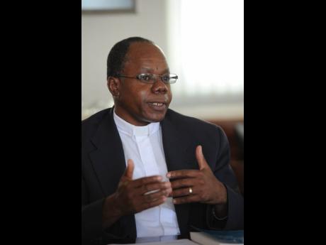 Canon Garth Minott was snubbed as the new Suffragan Bishop of Kingston.