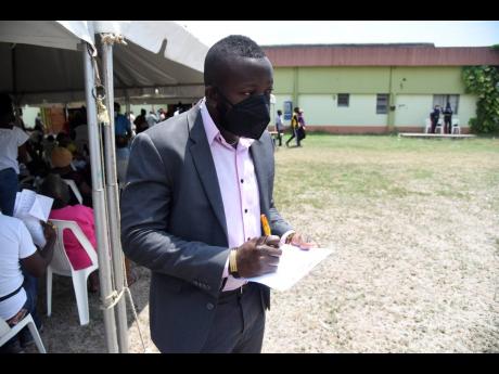 Jason Brown, 27, a sales executive, turned out to get vaccinated at Twickenham Park Open Bible Church on the fringes of Spanish Town on Monday.