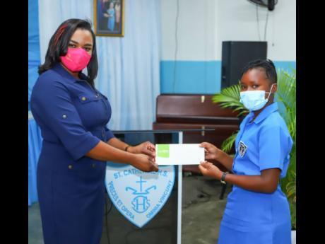 Sagicor Investments Advisor, Tashana Smith, presents Grade 7 student Shanae Gardner with her Sagicor Investments Sigma Global Funds gift certificate. 