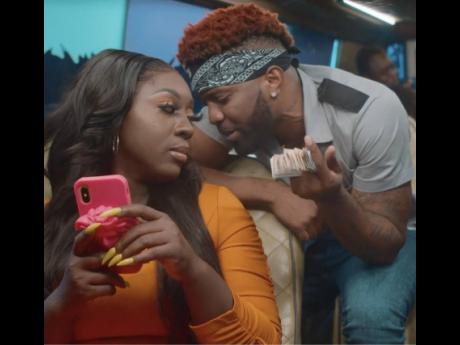 Konshens and Spice in a scene from their new music video, 'Pay For It'.