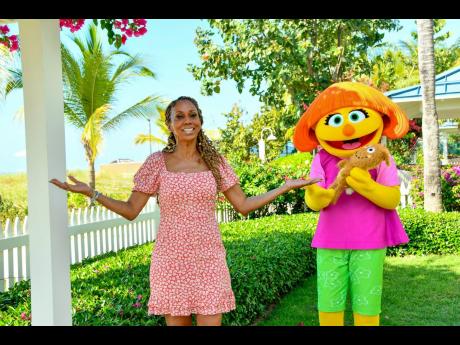 Actress and autism activist, Holly Robinson Peete enjoys a stay at Beaches Resorts alongside Julia, a muppet with autism that provides on-resort activities for those with sensory disorders. 