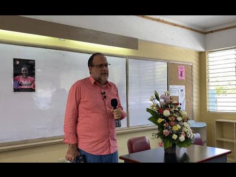 Opposition Leader Mark Golding addresses teachers at the Four Path Primary and Junior High School when he visited last Thursday to express his condolence at the death of grade-three teacher, Nattalie Dawkins.