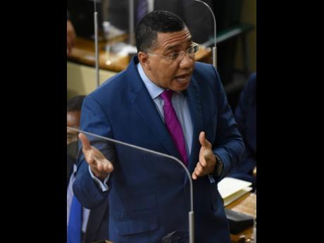 Prime Minister Andrew Holness making a statement on gender-based violence during the sitting of the House of Representatives on Tuesday.