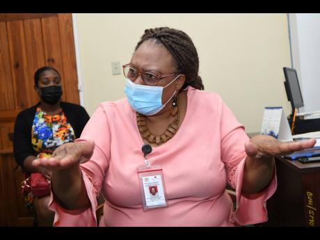 Marcia Mullings Thompson, CEO of the Bellevue Hospital in Kingston makes a point about the COVID isolation ward at the health facility yesterday.