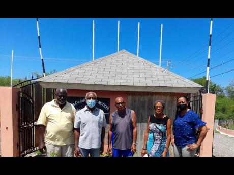 From left: Homeowners Pius Reis, Karl Barrett, Ivan McFarlane, Cecile Barrette and Dawn Foster are hoping that their concerns will be addressed soon.