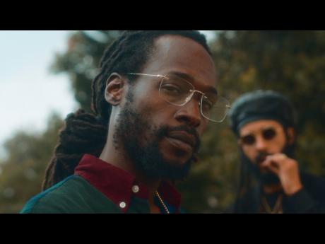 Jesse Royal (foreground) and Protoje in the ‘Rich Forever’ video. 