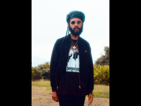  Protoje drew parallels on the ‘Rich Forever’ set in a Like Royalty Tee from his merchandise shop.