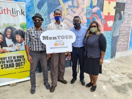 Bridgette Pancho (far right), vice-principal, Dunoon Park Technical High School was elated to have Foska Oats and the Youthlink-sponsored MenTOUR donating care packages to her school.  From left are: Kareem LaTouche, acting vice-principal Altino Facey, and