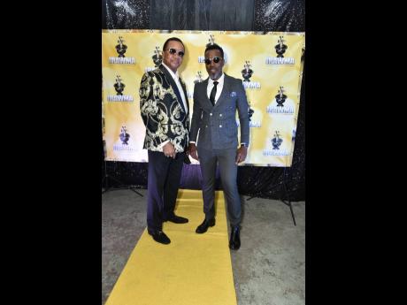 Artiste and tour manager Copeland Forbes (left) and OnStage host/producer Winford Williams are gold-carpet ready at last Sunday’s IRAWMA awards.