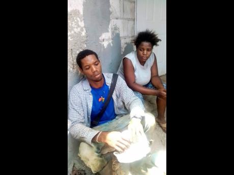 Omar Flowers and Crystal Johnson are a picture of grief, having lost their two infant sons in a fire at their home in Lilliput, St James, yesterday.