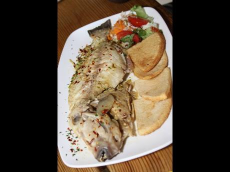 The steamed fish and fried bammy at White Sands Beach Seafood Restaurant.