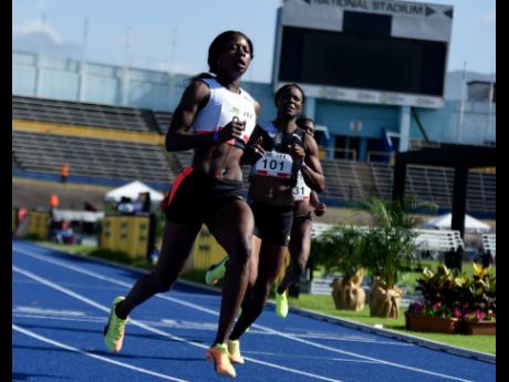 Shericka Jackson wins the women’s 100m dash at the JOA/JAAA Olympic Destiny Series at the National Stadium yesterday.