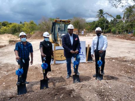 From left: Mayor of May Pen Winston Maragh; councillor for the Palmers Cross Division, Carlene Benjamin; Paul Walker of Halton Development Management; and Pearnel Charles Jr, housing minister and member of parliament for Clarendon South East, break ground 