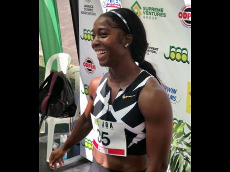 
Shelly-Ann Fraser-Pryce is all smiles after clocking 10.63 seconds to win the 100m at the JOA/JAAA Olympic Destiny Series at the National Stadium yesterday. The time is a new national record and the second fastest time in the event in history.