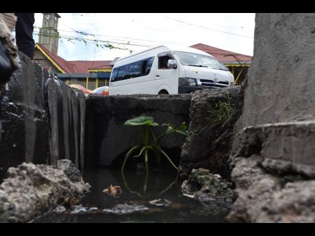 The main drain across from the Brown’s Town Market in St Ann is in need of attention.