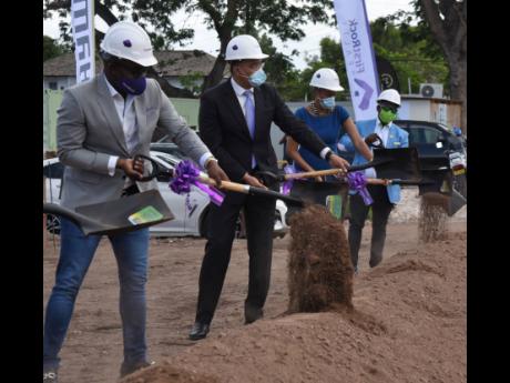 Prime Minister Andrew Holness (second left) break grounds for First Rock Capital Holdings’ Hambani Estates housing development with Ryan Reid (left), co-founder and group CEO, First Rock; St Andrew Eastern Member of Parliament Fayval Williams (second rig