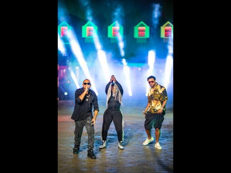 From left: Sean Paul, Spice and Shaggy perform during the shoot for their appearance on 'Jimmy Kimmel Live!'.