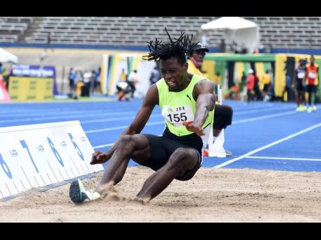 Tajay Gayle wins the long jump competition at the JAAA/JOA Olympic Destiny Series meet at the National Stadium on Saturday, June 5 with a distance of 8.56m.