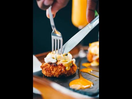 Take a bite of this tasty crab cake eggs benny.