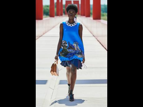 Based in Paris, SAINT model, Nigerian Tomiwa on the runway last week for Louis Vuitton's Resort 2022 collection. She zooms in from Europe for a chat with her model agent Deiwght Peters.