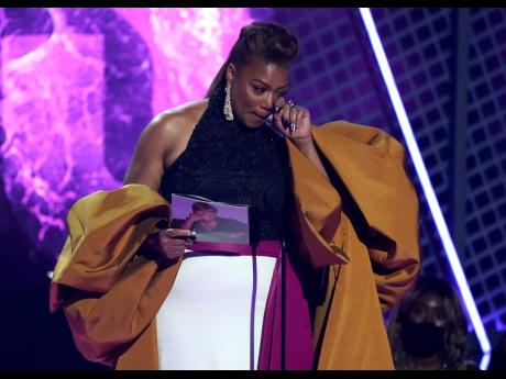 Queen Latifah tearfully accepts the Lifetime Achievement Award.
