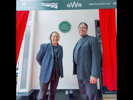 Renowned singer and actor Peter Straker (left) and Reverend Michael King, son of Windrush pioneer Sam King, at the unveiling of the Windrush Generation Green Plaque at Paddington Station, London.