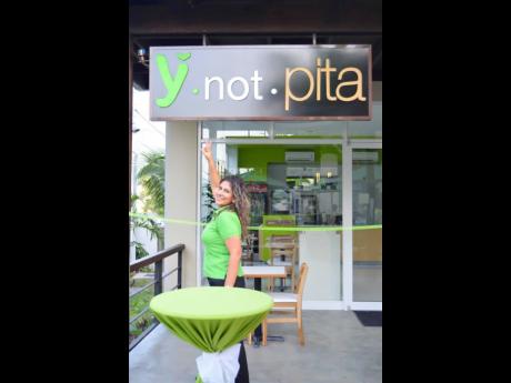 Nancy Hado, co-principal of Y Not Pita. The Hados opened the doors to the eatery in  July 9, 2012.