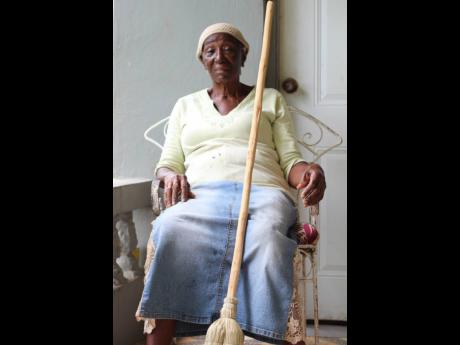 Dezeta Ranger is one of the eldest, and few women in Canaan Heights, who developed a special way of sewing the wire into the silver thatch used to make house brooms.